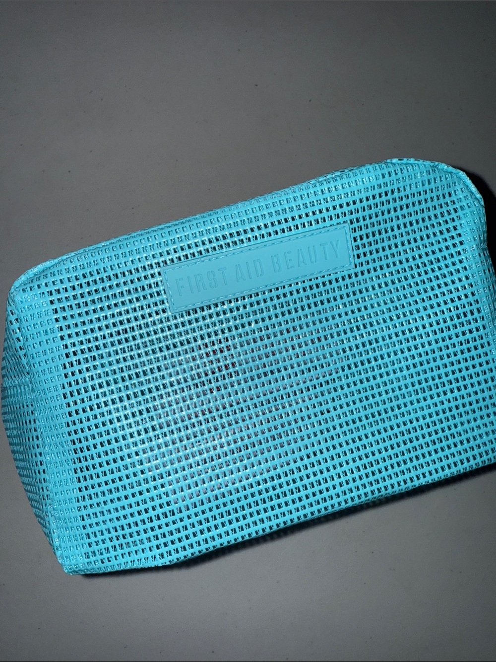 First Aid Beauty Mesh Makeup Bag w/ First Aid Beauty Products inside!